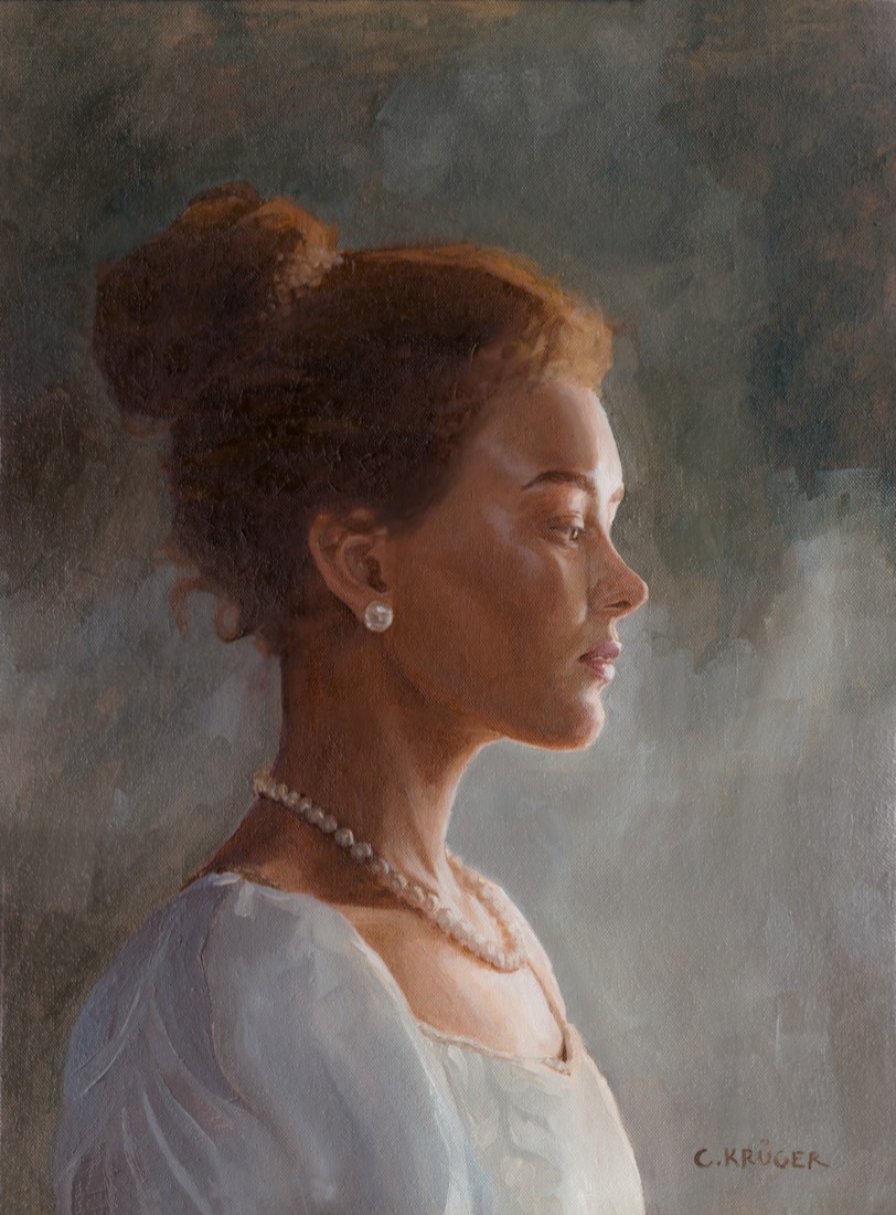 side view portrait of a beautiful woman in a wedding dress